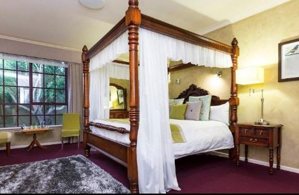 A comfortable hotel room with modern amenities and a cozy bed, part of Perth Hills accommodation